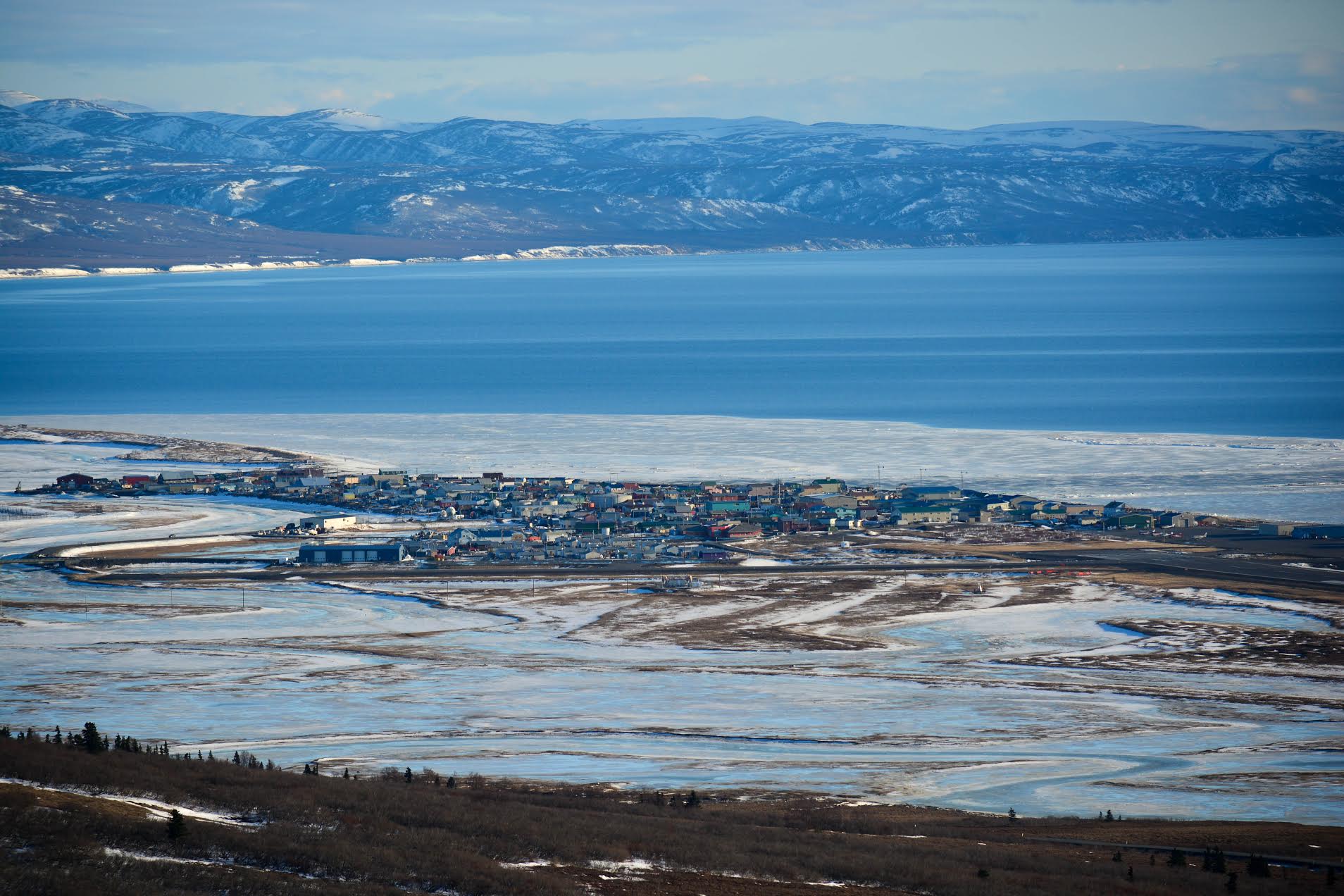 This photo of Unalakleet was taken in April, when water normally has been covered with ice and snow. Photo by Fisher Dill.